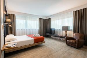 Кровать или кровати в номере Hotel Dimorae Rooms and Suites - Apartments