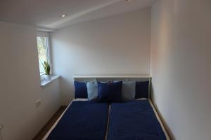 Postel nebo postele na pokoji v ubytování AAR Nordsee Appartement