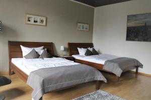
Ein Bett oder Betten in einem Zimmer der Unterkunft Hotel Schmerkötter
