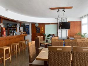 Restaurace v ubytování vacaciones frente al mar