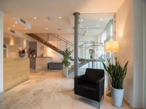 Гостиная зона в Hotel Dimorae Rooms and Suites - Apartments