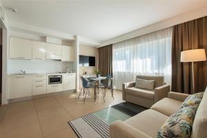 Η κουζίνα ή μικρή κουζίνα στο Hotel Dimorae Rooms and Suites - Apartments