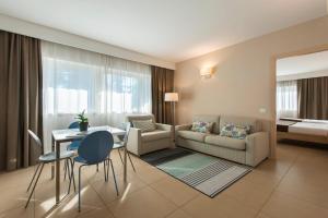 Гостиная зона в Hotel Dimorae Rooms and Suites - Apartments