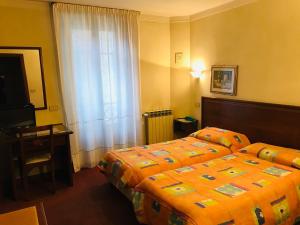 Postel nebo postele na pokoji v ubytování B&B Franceschi