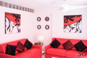 Część wypoczynkowa w obiekcie My Sweet Red Apartment