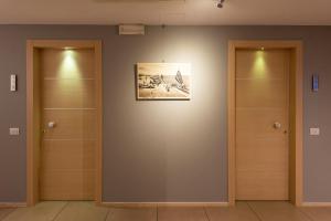 Фотография из галереи Hotel Dimorae Rooms and Suites - Apartments в Чивитанова-Марке