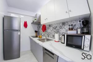 Kuchnia lub aneks kuchenny w obiekcie My Sweet Red Apartment