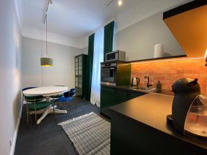 Η κουζίνα ή μικρή κουζίνα στο Nordischer Hof Apartments, Free Parking