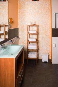 Kylpyhuone majoituspaikassa Apartamentos Y Posada El Cafetal