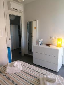 Posteľ alebo postele v izbe v ubytovaní casa vacanze Thea