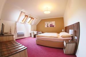 Voodi või voodid majutusasutuse Hotel Koruna toas