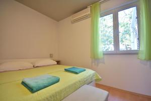 Postel nebo postele na pokoji v ubytování Room 4 Two + 5 fotografií