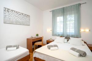 Postel nebo postele na pokoji v ubytování Apartment Nela Kalina