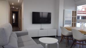 Televízia a/alebo spoločenská miestnosť v ubytovaní Vistalegre Sea Views - Fabulosas Vistas en 1ª línea