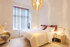 Voodi või voodid majutusasutuse Exquisite apartment, most convenient location, Apt 5. toas