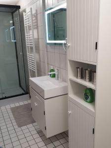 Et badeværelse på City-Appartement Vogel