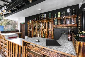 a bar with a laptop on a counter at Big Tree Hostel in Kathmandu