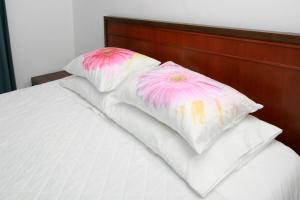 Cama ou camas em um quarto em Dias House
