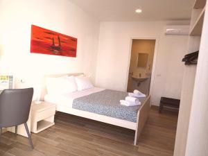 Voodi või voodid majutusasutuse Academy Hotel toas