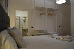 Posteľ alebo postele v izbe v ubytovaní B&B Il Viaggiatore