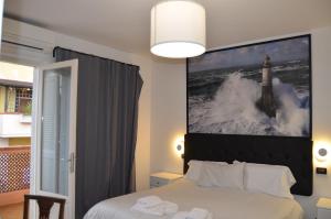 Posteľ alebo postele v izbe v ubytovaní B&B Il Viaggiatore