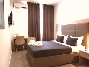 Voodi või voodid majutusasutuse Academy Hotel toas