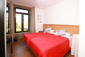 Cama ou camas em um quarto em Dias House