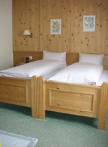 Postel nebo postele na pokoji v ubytování Tamina Hotel