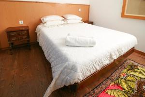 Cama ou camas em um quarto em Dias House