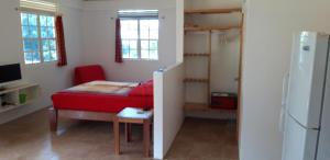 Cucina o angolo cottura di Mango Garden Cottages
