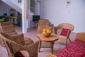 Posezení v ubytování Mango Garden Cottages