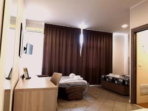 Voodi või voodid majutusasutuse Academy Hotel toas