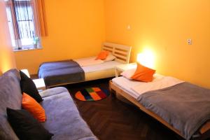 Posteľ alebo postele v izbe v ubytovaní Hostel Centrum Sabot