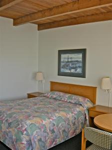 Postel nebo postele na pokoji v ubytování Azalea Lodge