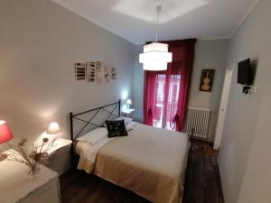Postel nebo postele na pokoji v ubytování Segui le note della Tua vita