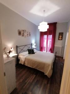 Postel nebo postele na pokoji v ubytování Segui le note della Tua vita
