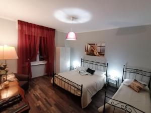 Postel nebo postele na pokoji v ubytování Segui le note della Tua vita