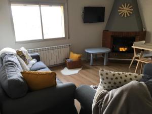 Posezení v ubytování Apartaments La Pertusa 1r piso