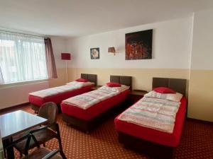 Un pat sau paturi într-o cameră la Eurostopas