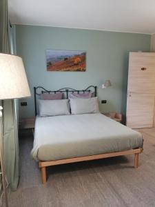 Ένα ή περισσότερα κρεβάτια σε δωμάτιο στο A cà ed Franca e Giaco