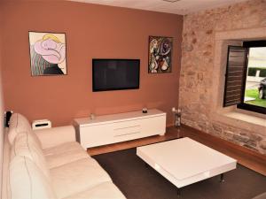 Телевизор и/или развлекательный центр в Apartamento Rural Sorribos (VUT-CO-004306)