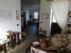 a living room with a couch and a table at Villa Frane 101 in Beli