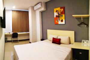 Voodi või voodid majutusasutuse Valore Hotel toas