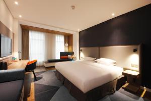 Postel nebo postele na pokoji v ubytování Holiday Inn Express Hefei Shushan by IHG