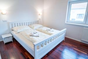 Posteľ alebo postele v izbe v ubytovaní Apartmány Habánská, celý dům