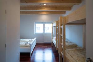 Posteľ alebo postele v izbe v ubytovaní Apartmány Habánská, celý dům