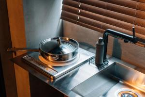 Køkken eller tekøkken på mizuka Nakasu 1 - unmanned hotel -