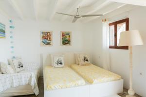 Ένα ή περισσότερα κρεβάτια σε δωμάτιο στο Electra Pool Villa Skiathos +71 φωτογραφίες