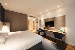 Postel nebo postele na pokoji v ubytování Holiday Inn Express Hefei Shushan by IHG