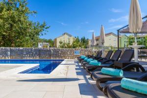 Πισίνα στο ή κοντά στο Luxury Apartments Villa Mande